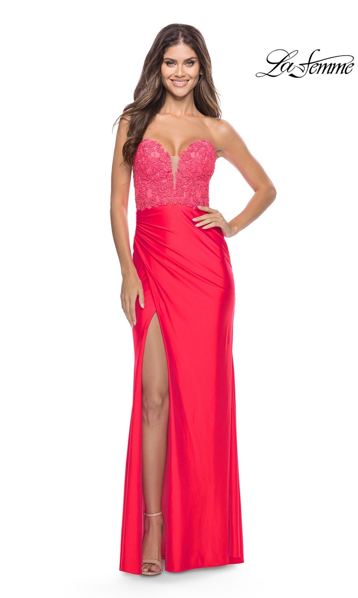 La Femme 31411 neon coral strapless floor-length gown featuring a lace corset bodice, a sweetheart neckline, and a high leg slit.